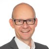 Portrettfoto av Geir Axelsen, administrerende direktør i Statistisk sentralbyrå